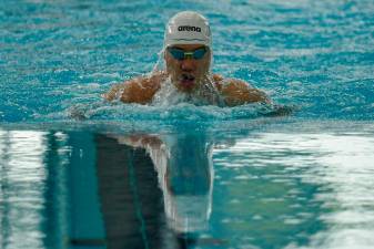 Swimmer Bryan betters his national 100m butterfly record in Doha